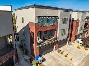 View of building exterior with a garage