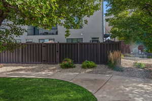 View of yard with a balcony