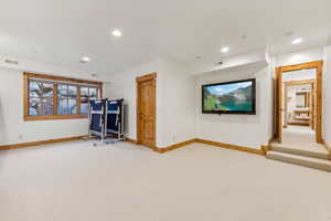 Unfurnished living room with carpet flooring