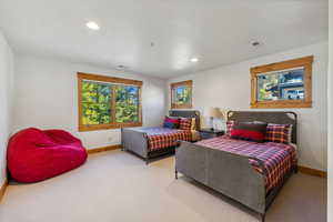 Bedroom featuring carpet