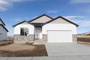 View of front of house with a garage