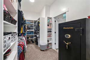 Spacious closet featuring carpet floors