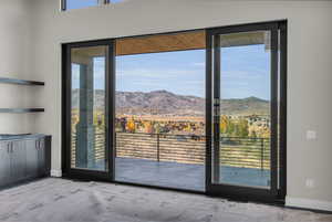 Living room  with a mountain view and a healthy amount of sunlight