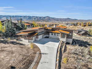 View of front of home featuring a mountain view