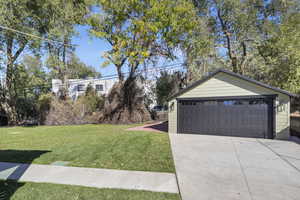 Garage with new roof, siding, and 240 amp panel for EV cars