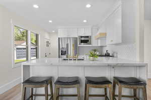 Kitchen with bar stool area