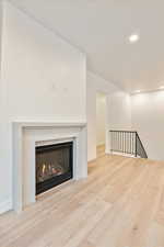 Unfurnished living room featuring light wood-type flooring