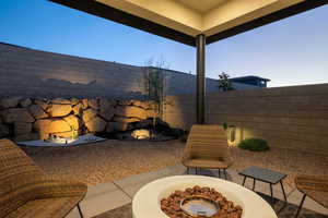 View of patio / terrace with an outdoor fire pit