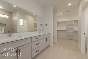 Bathroom with vanity and walk in shower