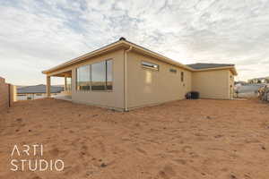 View of side of property featuring central AC unit