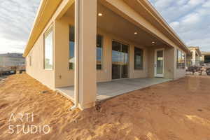 Rear view of house with a patio area