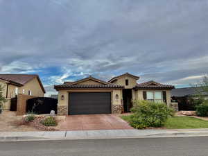 View of front of house with a garage