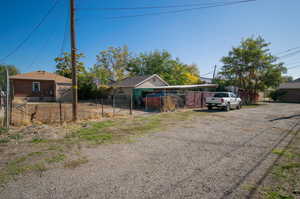 Private alley with access code on each entrance. This is facing south.