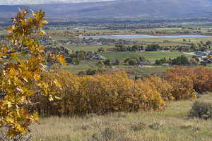 Mountain view featuring a water view and a rural view