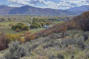 View of mountain feature with a rural view