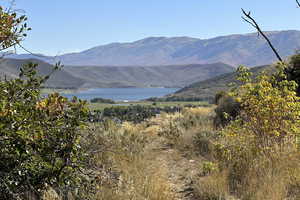 View of mountain feature with a water view