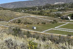 View of mountain feature with a rural view