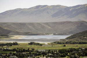 View of mountain feature with a water view