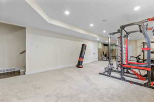 Exercise room featuring carpet floors