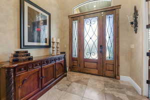 Foyer entrance featuring a healthy amount of sunlight