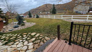 View of yard with a mountain view