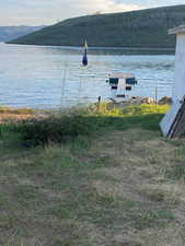 View of water feature with a mountain view