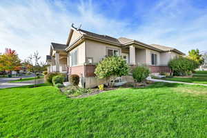 Exterior space with a front yard