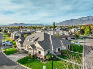 Birds eye view of property with a mountain view