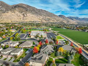 Birds eye view of property with a mountain view