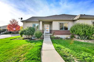 View of front of home featuring a front yard