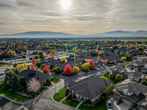 Aerial view at dusk featuring a mountain view