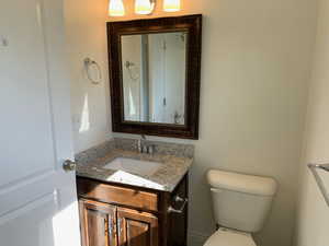 Bathroom with vanity and toilet