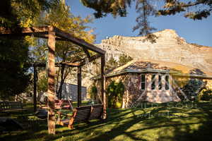 Home featuring Balance Rock  view and a lawn