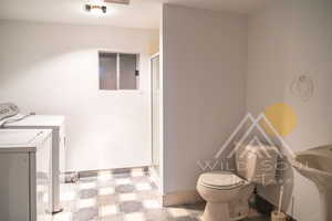 Washroom with shower and washer/dryer