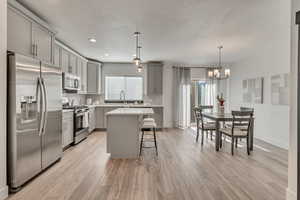 Kitchen with dining room and island