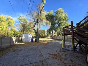 View of yard with a shed