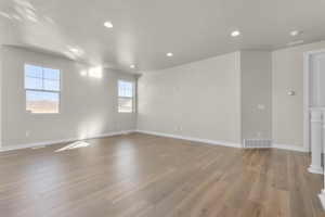 Unfurnished room featuring light wood-type flooring