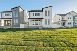 View of front of house with a front lawn