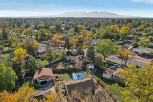 Birds eye view of property with a mountain view