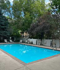 The pool offers security and privacy during hot summer days,