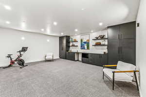 Sitting room with light colored carpet