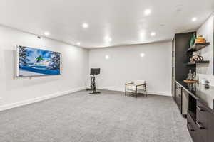 Interior space featuring light colored carpet