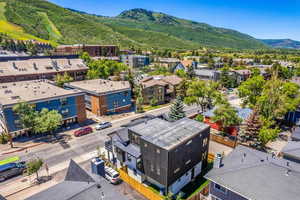 Drone / aerial view featuring a mountain view