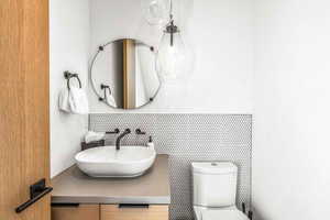 Bathroom with vanity and toilet