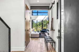 Entryway with light wood-type flooring