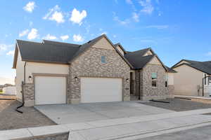 View of front of home featuring a garage