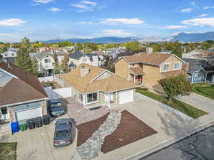 Birds eye view of property featuring a mountain view