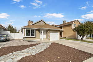 View of front of home featuring a garage