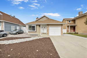 View of front of home with a garage