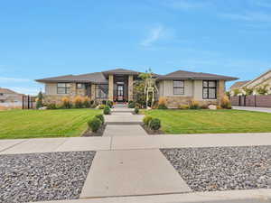 Prairie-style house with a front lawn